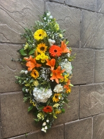 Orange Yellow and White Coffin Spray